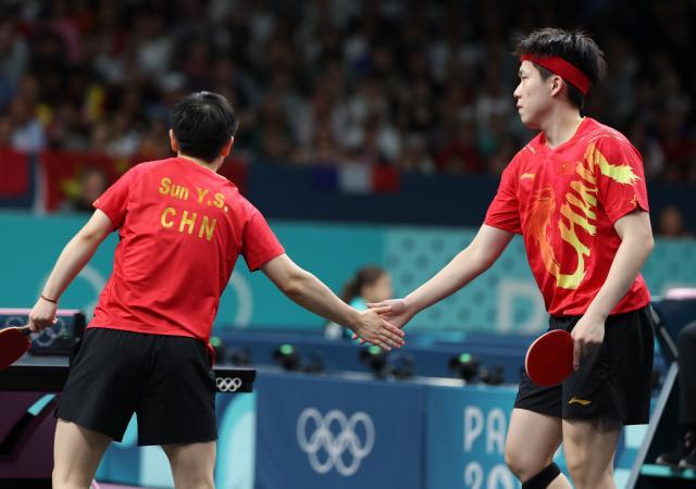 1722209449936037784.jpg 巴黎奥运会_乒乓球——混双:王楚钦_孙颖莎晋级八强+XxjpseC007447_20240728_MVPFN0A001.jpg